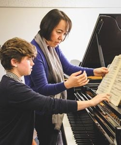 Piano student and instructor